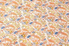 Cornflower Daisy Trail block printed cotton fabric showing floral pattern across the fabric surface