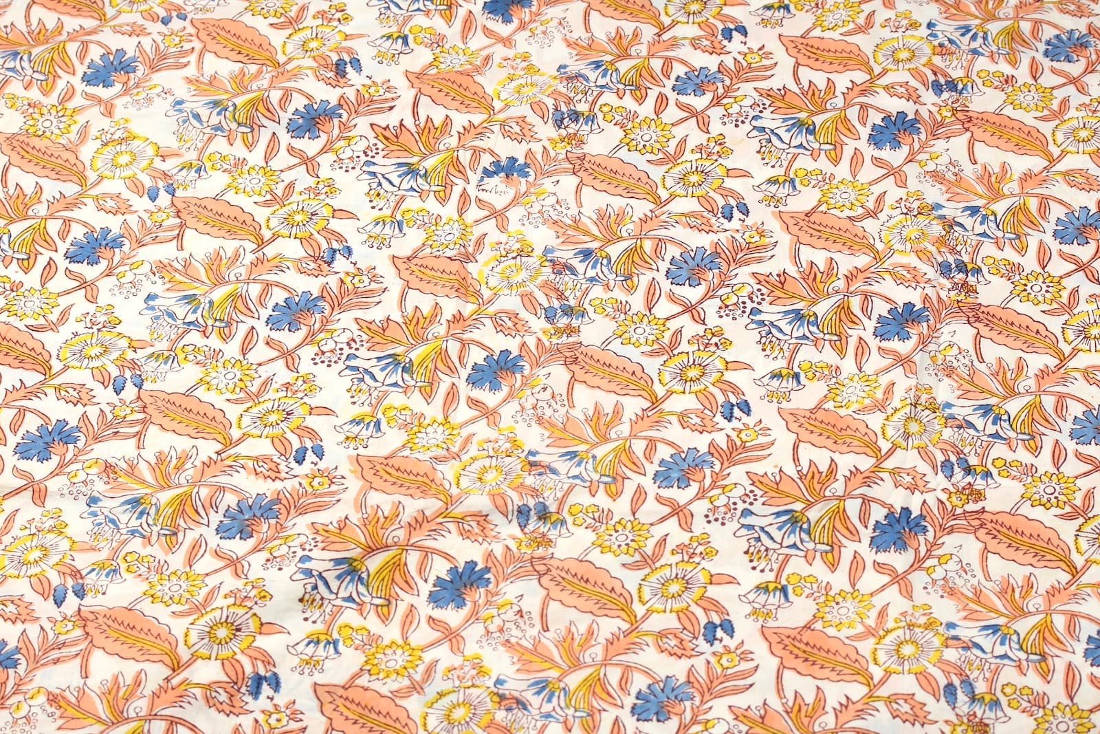 Cornflower Daisy Trail block printed cotton fabric showing floral pattern across the fabric surface