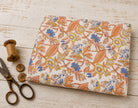 Cornflower Daisy Trail block printed cotton fabric showing floral pattern across the fabric surface