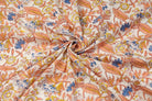 Close-up detail of Cornflower Daisy Trail block printed cotton fabric showing blue flowers and yellow daisies