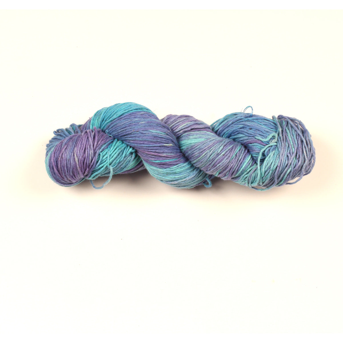 Hand-dyed Cotton Linen Yarn – “Lavender Drift” shade in turquoise and lavender tones on white background.