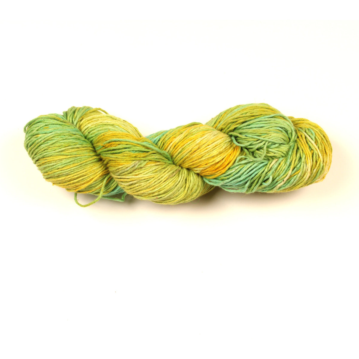 Cotton Linen Yarn – “Lime Grove” in bright yellow and green tie-dye tones, soft hand-dyed yarn on white surface.