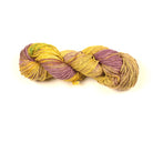 Hand-dyed Cotton Linen Yarn – “Woodland Mist” shade in brownish-purple, yellow, and green tones on white surface.