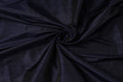 Deep Navy Dupion Silk Fabric arranged in elegant swirling folds highlighting its luxurious sheen and natural dupion silk texture
