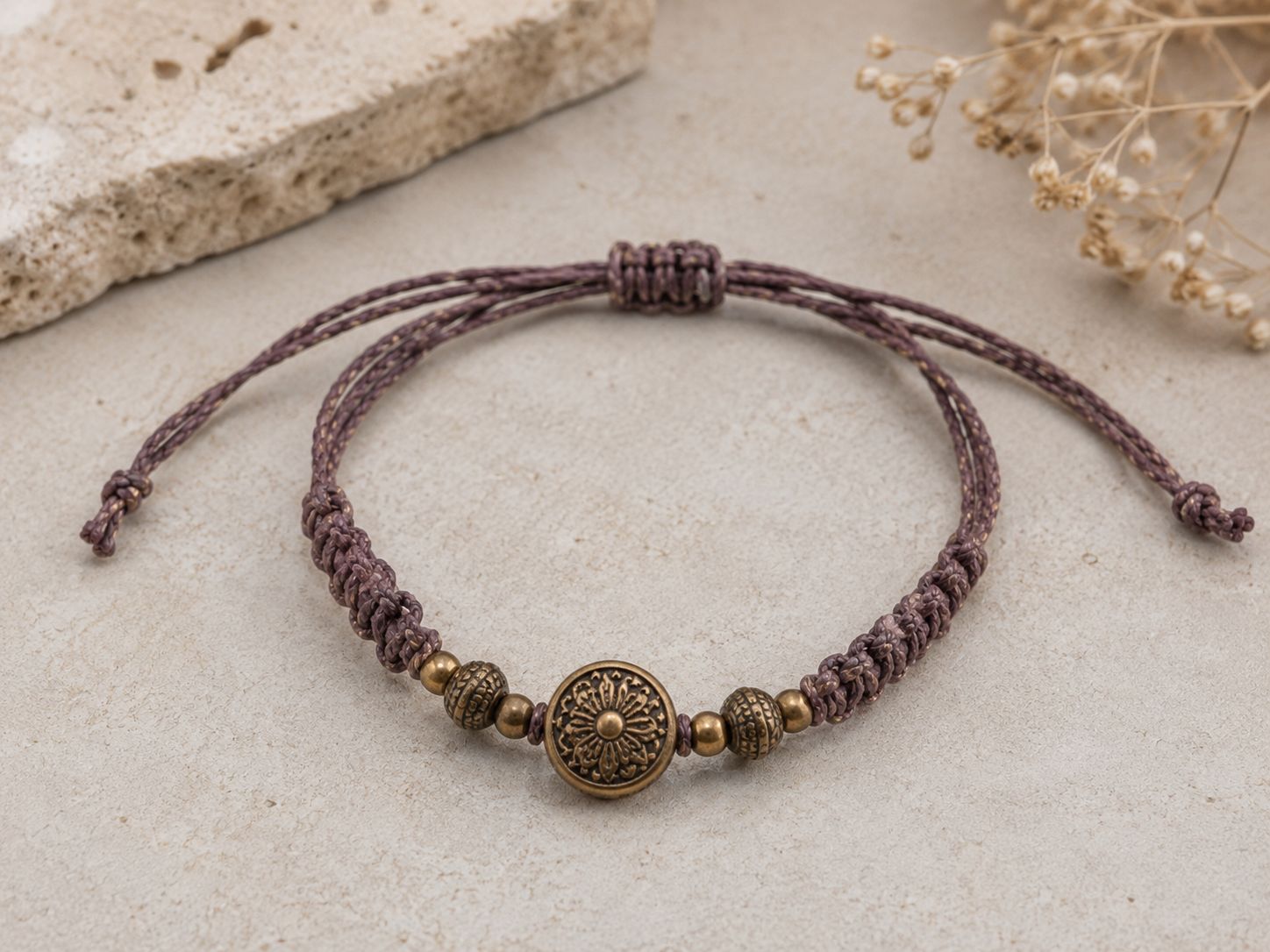 Handmade bracelet created with dusty mauve sari silk cord