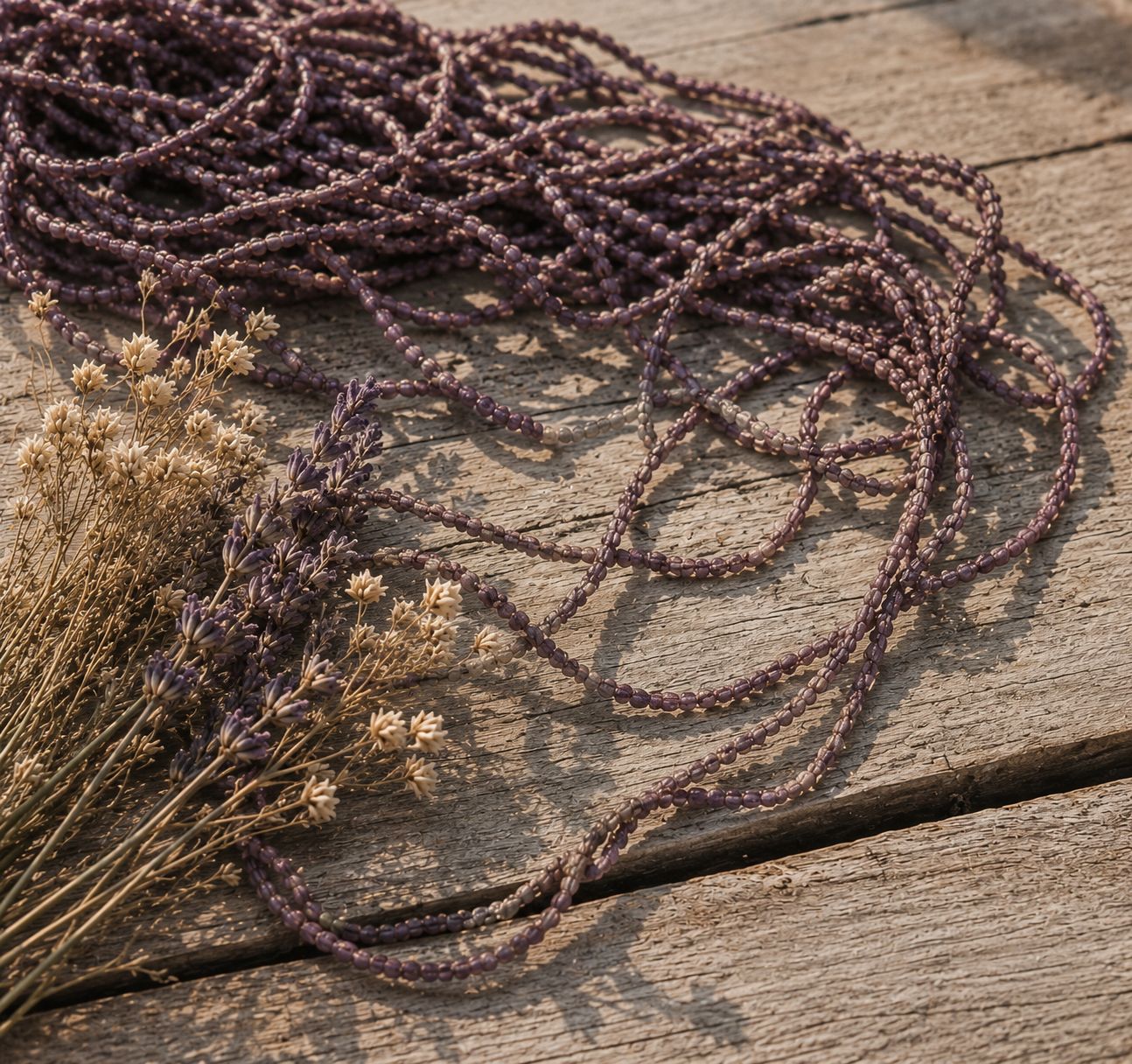 Dusty mauve sari silk cord styled for creative craft and textile projects