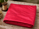 Electric Pink Dupion Silk Fabric folded to display its vibrant hot pink colour, natural silk texture, and luxurious sheen