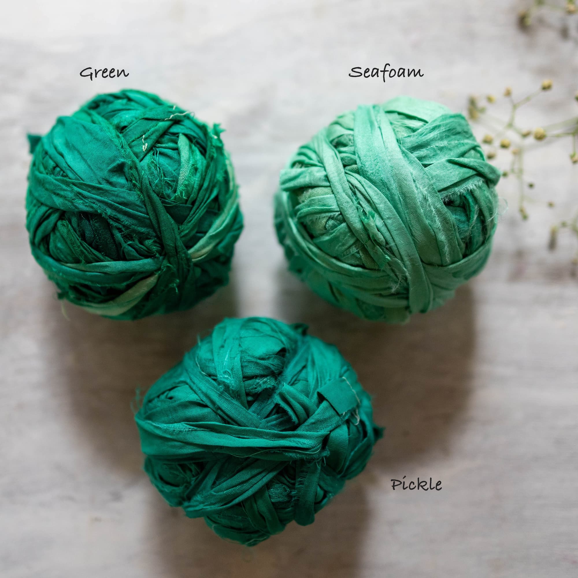 green saree silk ribbon in a fresh pastel tone, lightweight and hand-dyed for creative projects.