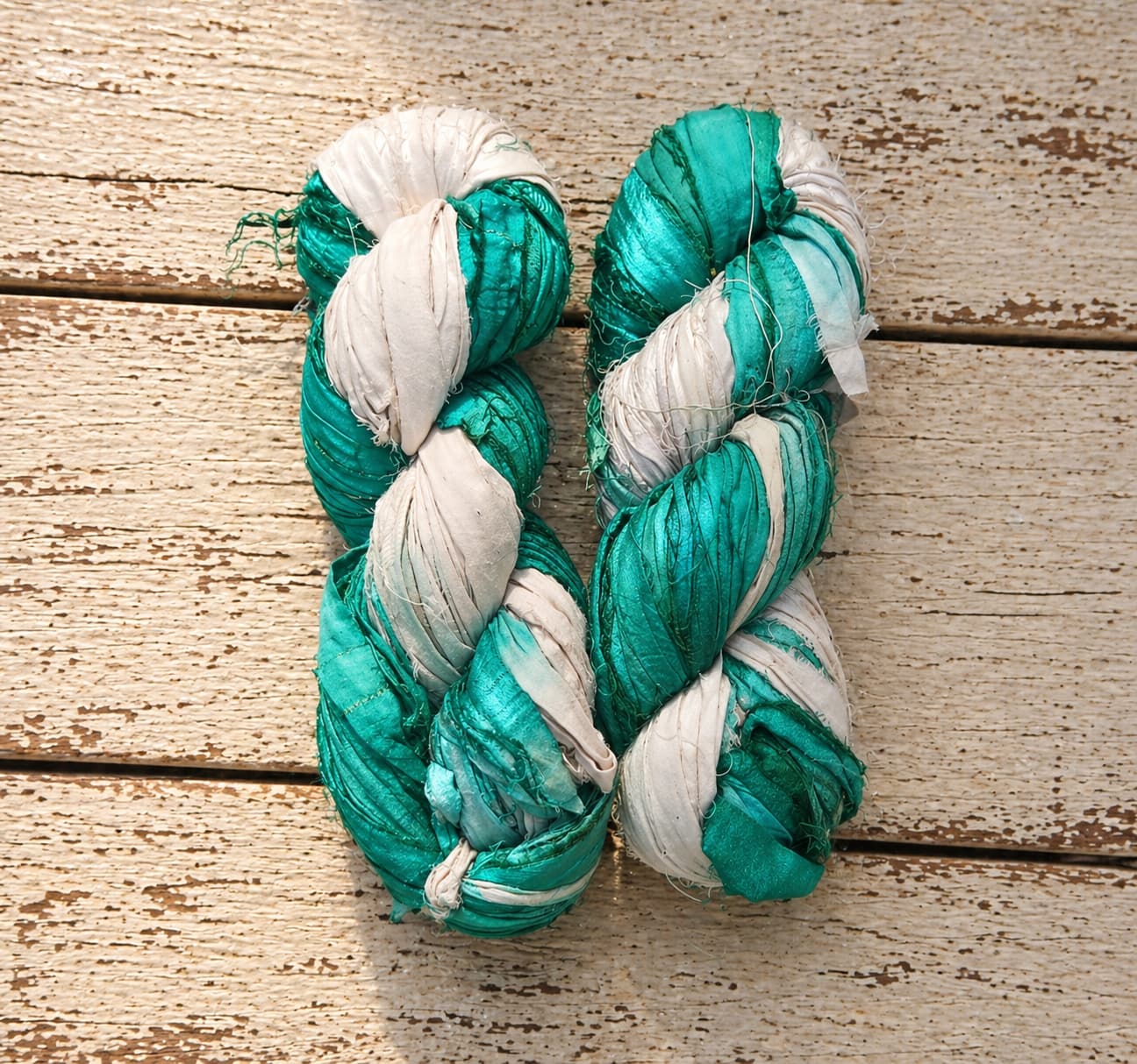 Seafoam and ivory sari silk ribbon yarn skeins in turquoise green and cream tones