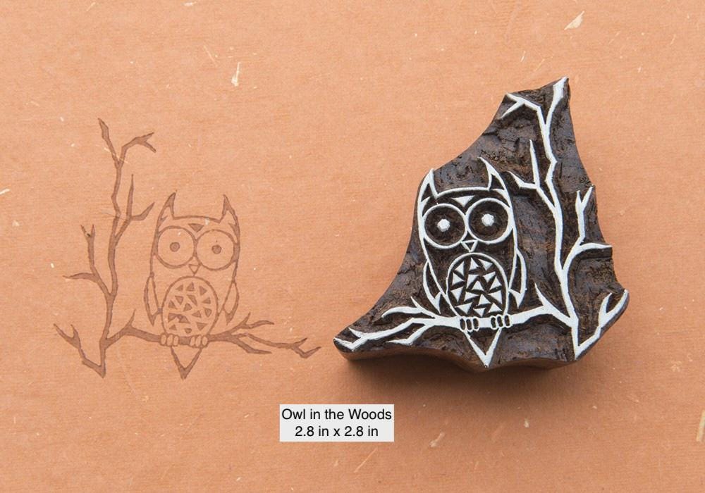 Owl in the woods hand carved wooden printing block showing owl on tree branch, traditional Indian stamp
