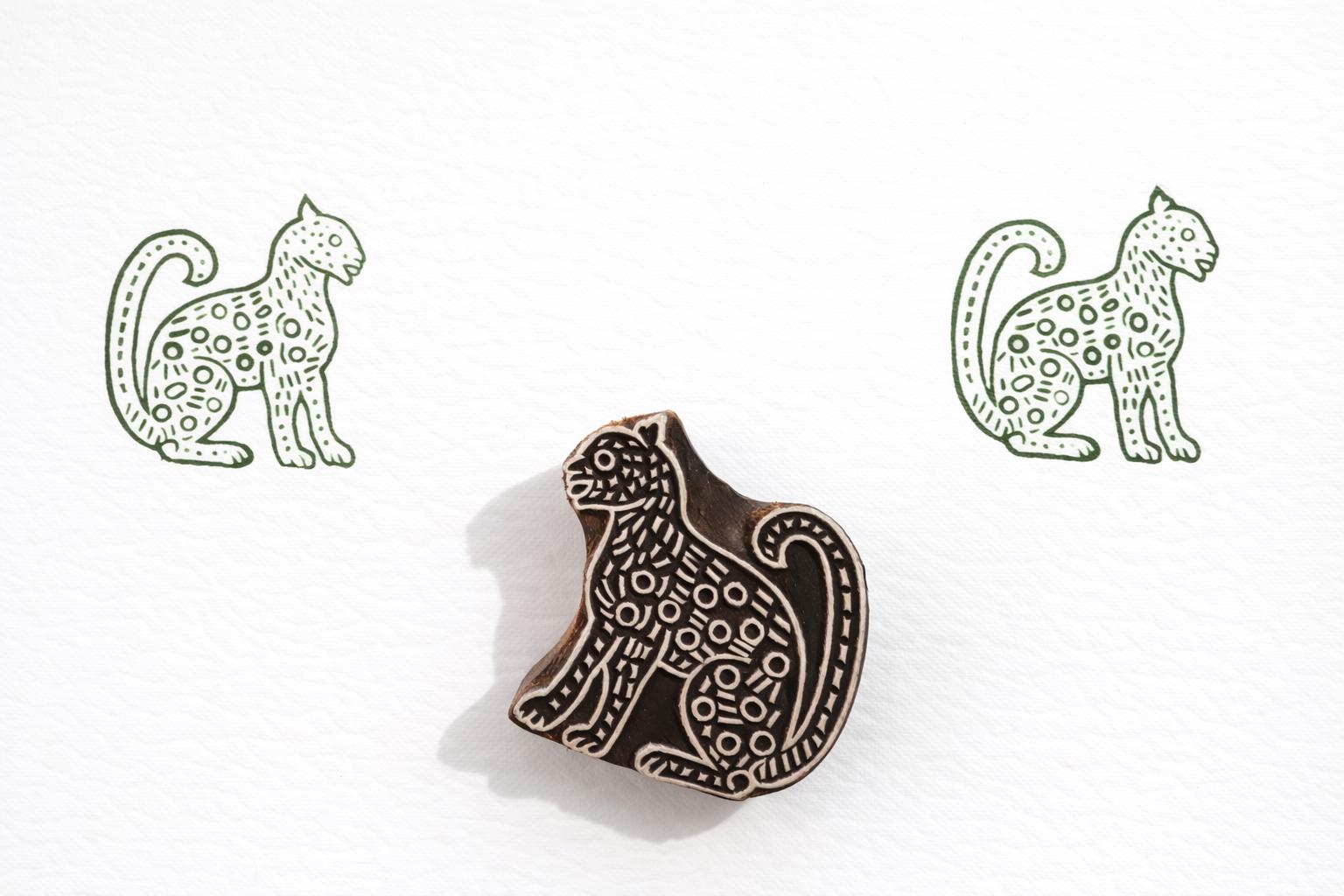 Hand carved wooden jungle cat block printing stamp for fabric printing, textile stamping and pottery decoration.