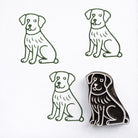 Labrador dog block print stamp with green ink impressions on paper