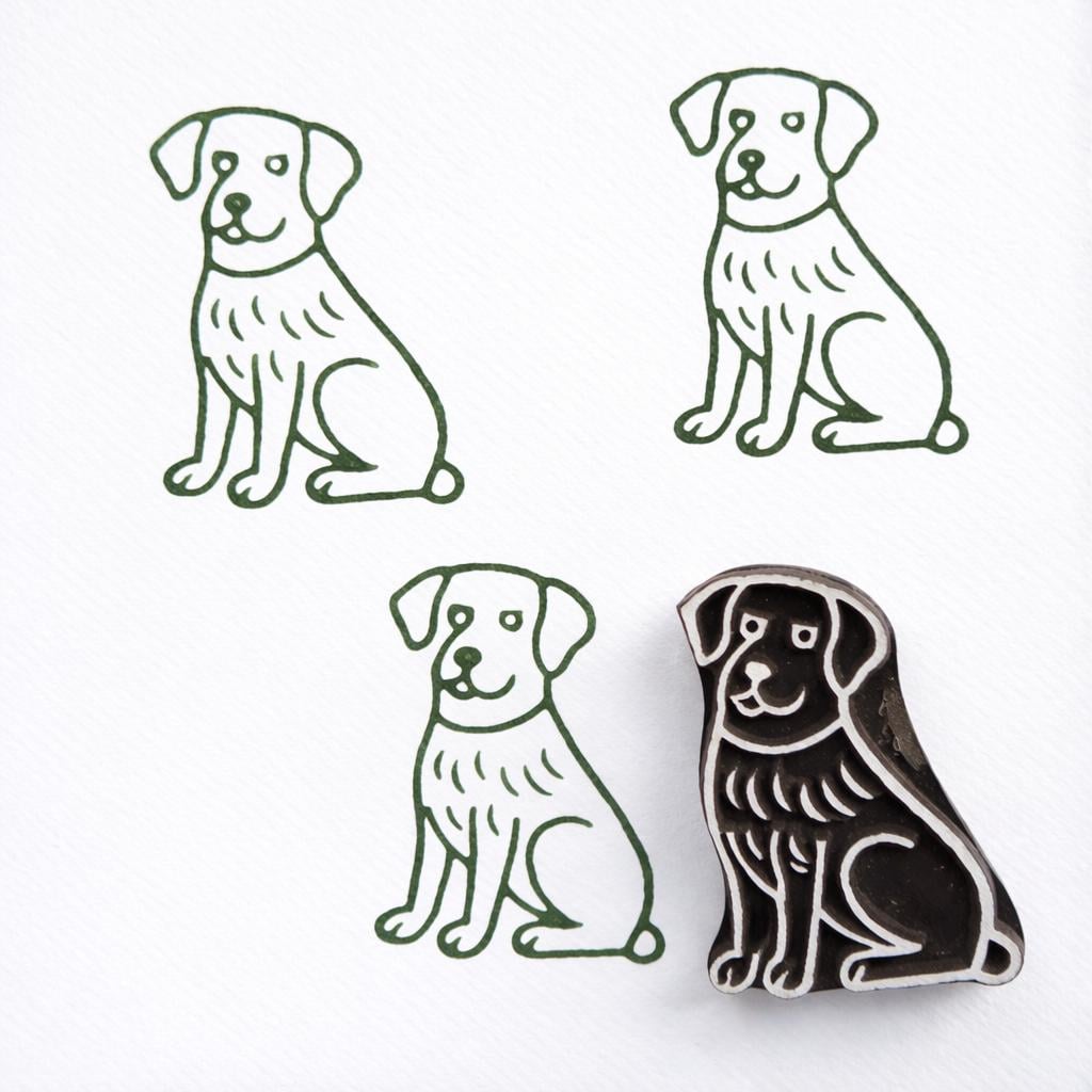 Labrador dog block print stamp with green ink impressions on paper