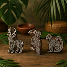 Hand carved wooden block printing stamps featuring deer, toucan bird and spotted cat animal designs for fabric printing, pottery and textile crafts.