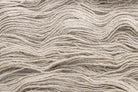 Close up texture of machine spun hemp and wool blend yarn showing natural fiber detail