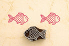 Fish wooden printing block used on fabric showing pink textile print block print stamp for fabric
