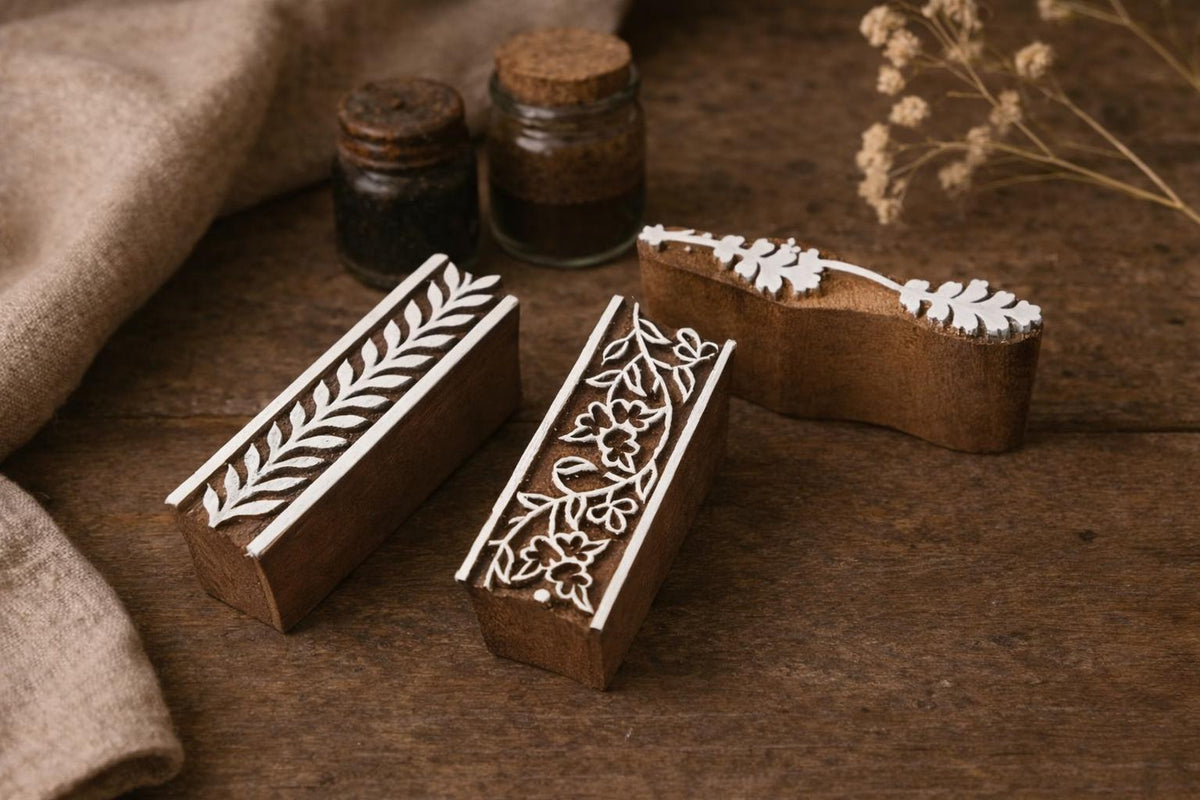 Set of three handmade wooden border block print stamps with floral and leaf patterns