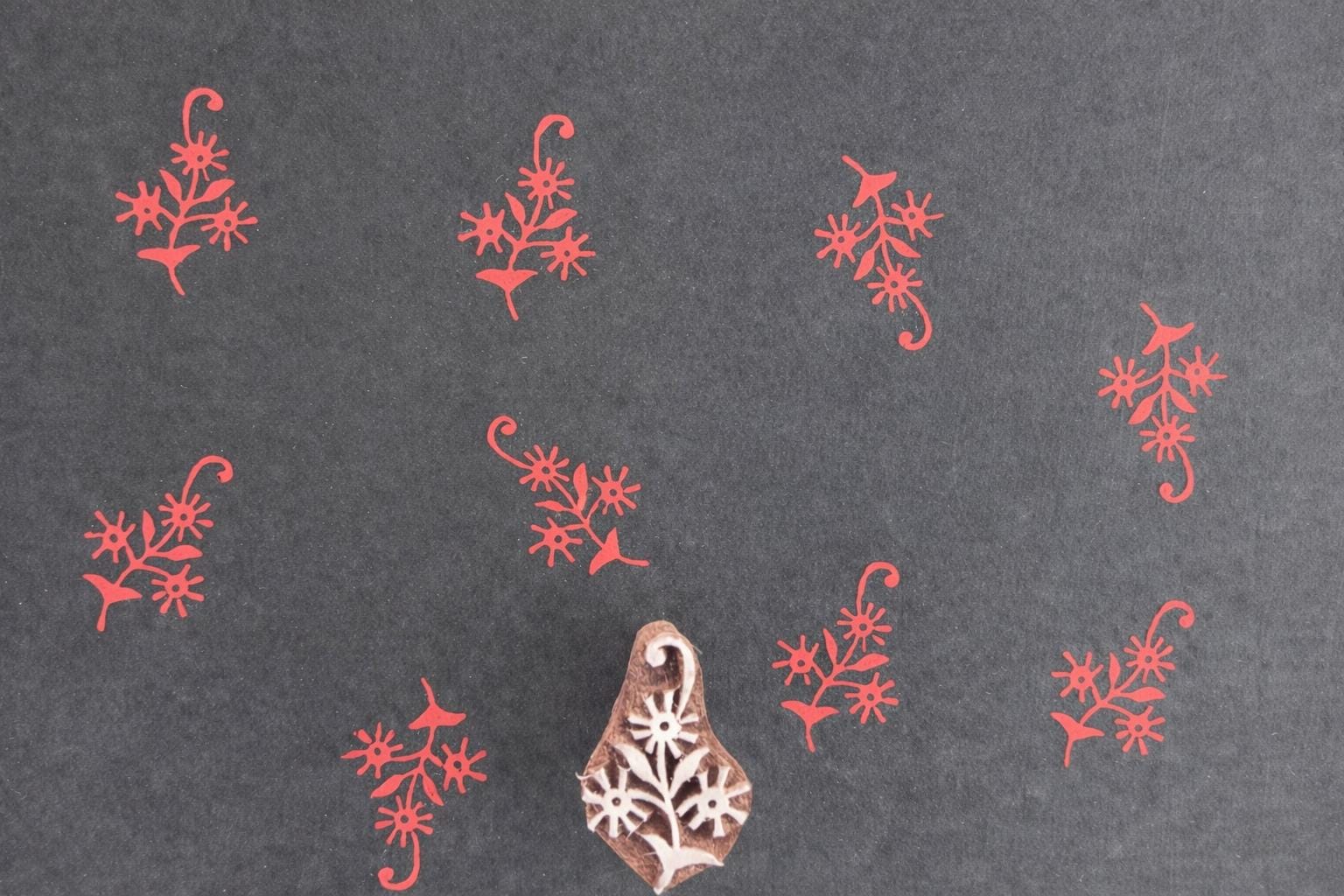 Wooden block stamp with small wildflower cluster design