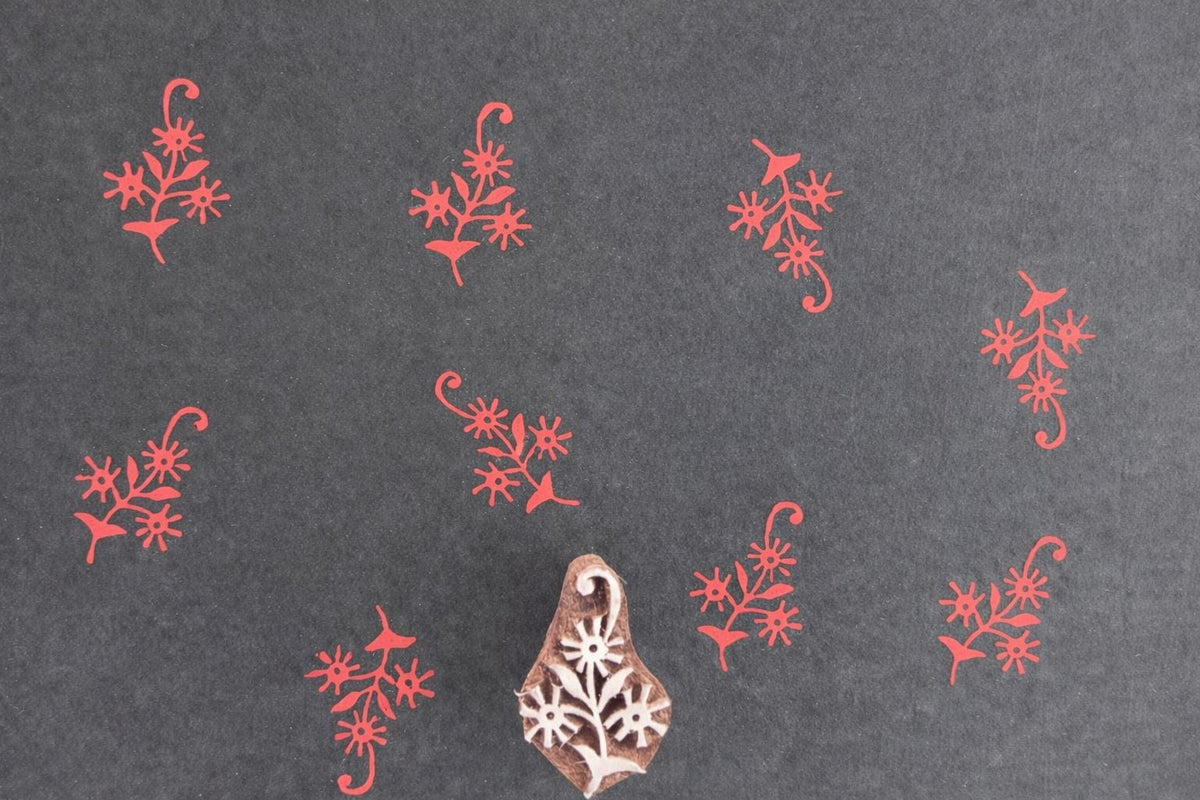 Wooden block stamp with small wildflower cluster design