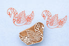 Hand carved swan wood block stamp with floral detail printed on fabric