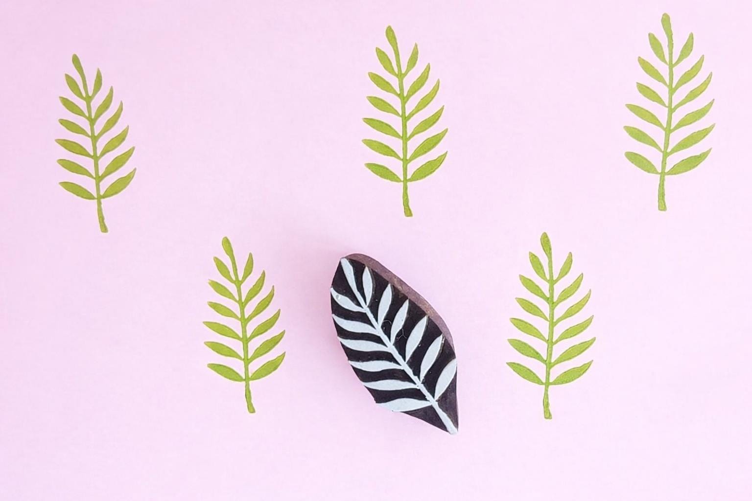 Fern leaf wooden block printing stamp printing repeating botanical pattern