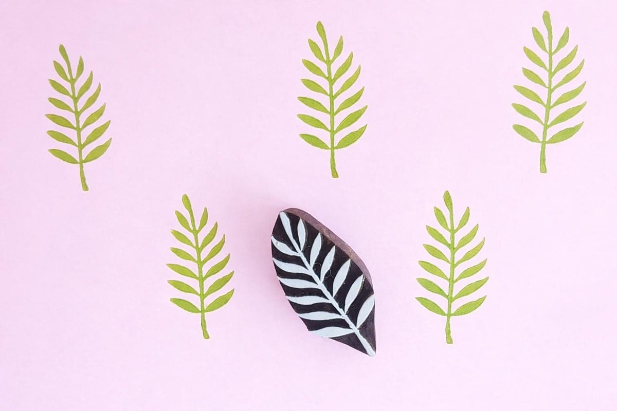 Fern leaf wooden block printing stamp printing repeating botanical pattern