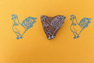 Hand carved wooden block printing stamp with rooster chicken design for fabric printing, farmhouse crafts, and pottery