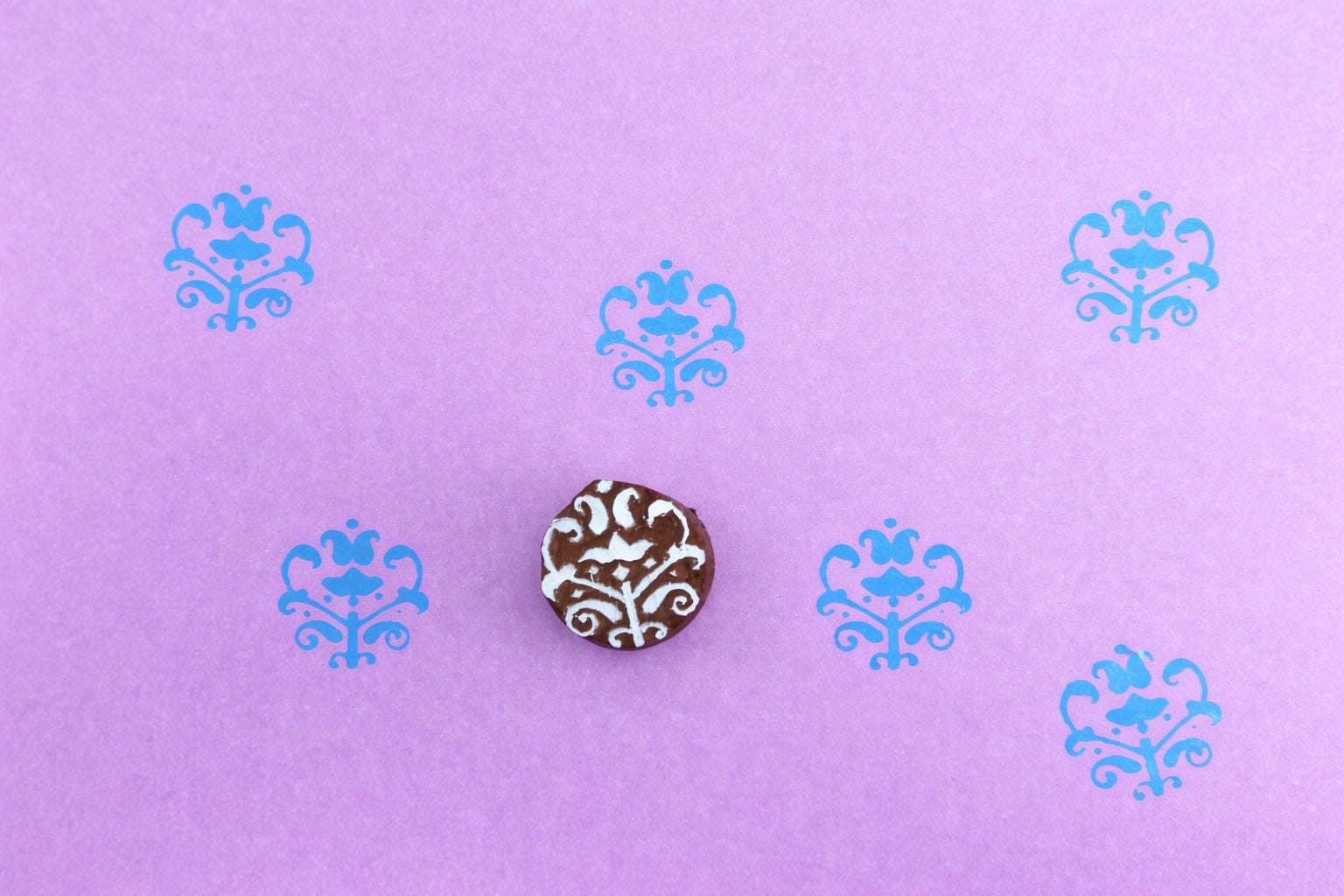 Hand carved wooden printing stamp with ornamental floral damask design for fabric printing, textile patterns, and clay pottery