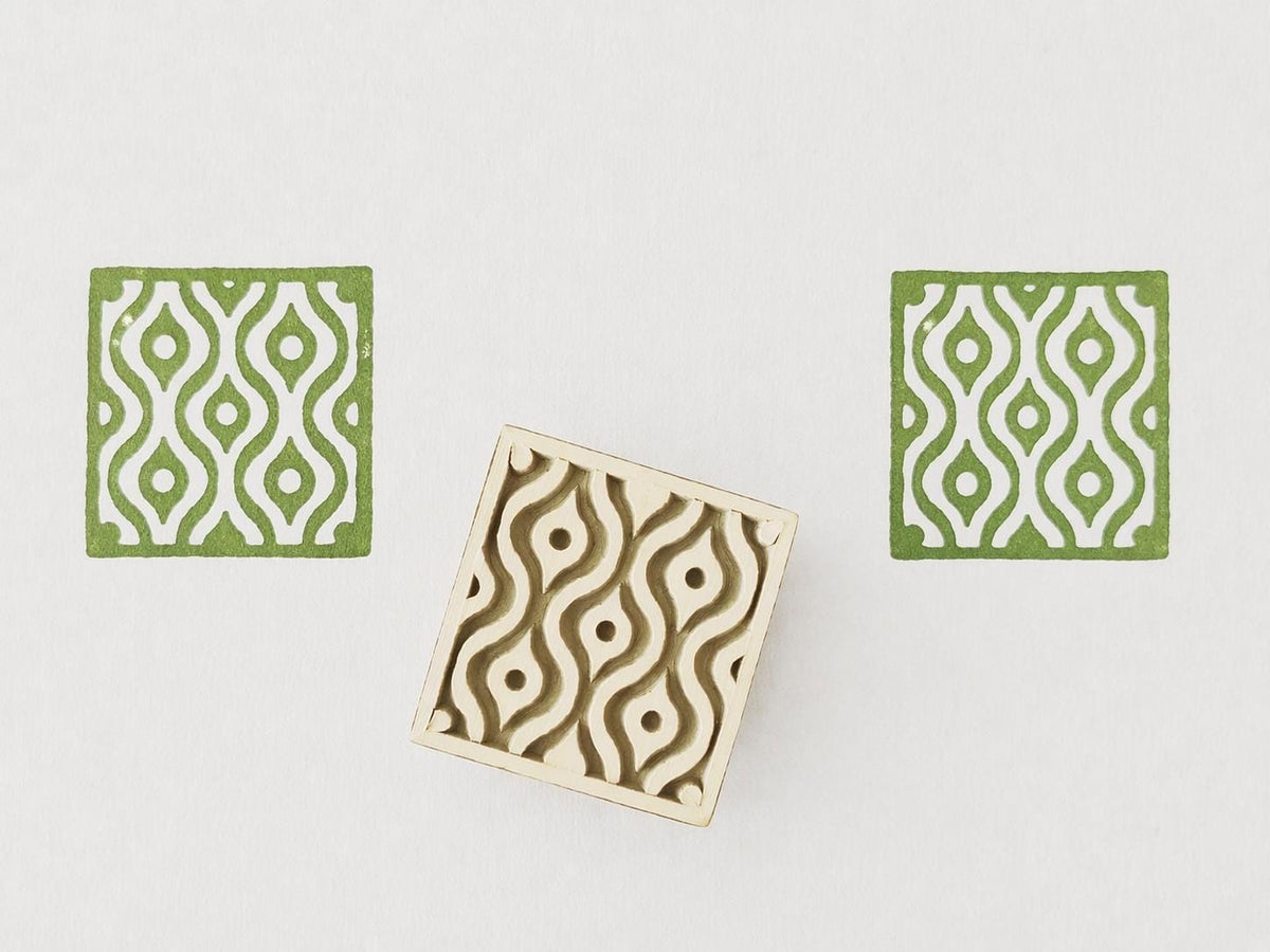🖼️ Alt Text

Hand carved Indian wooden block printing stamp with geometric pattern used for fabric, textile, and clay printing on white background.
