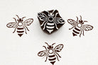 Bee wooden printing stamp used for fabric and clay printing showing brown textile prints block stamp