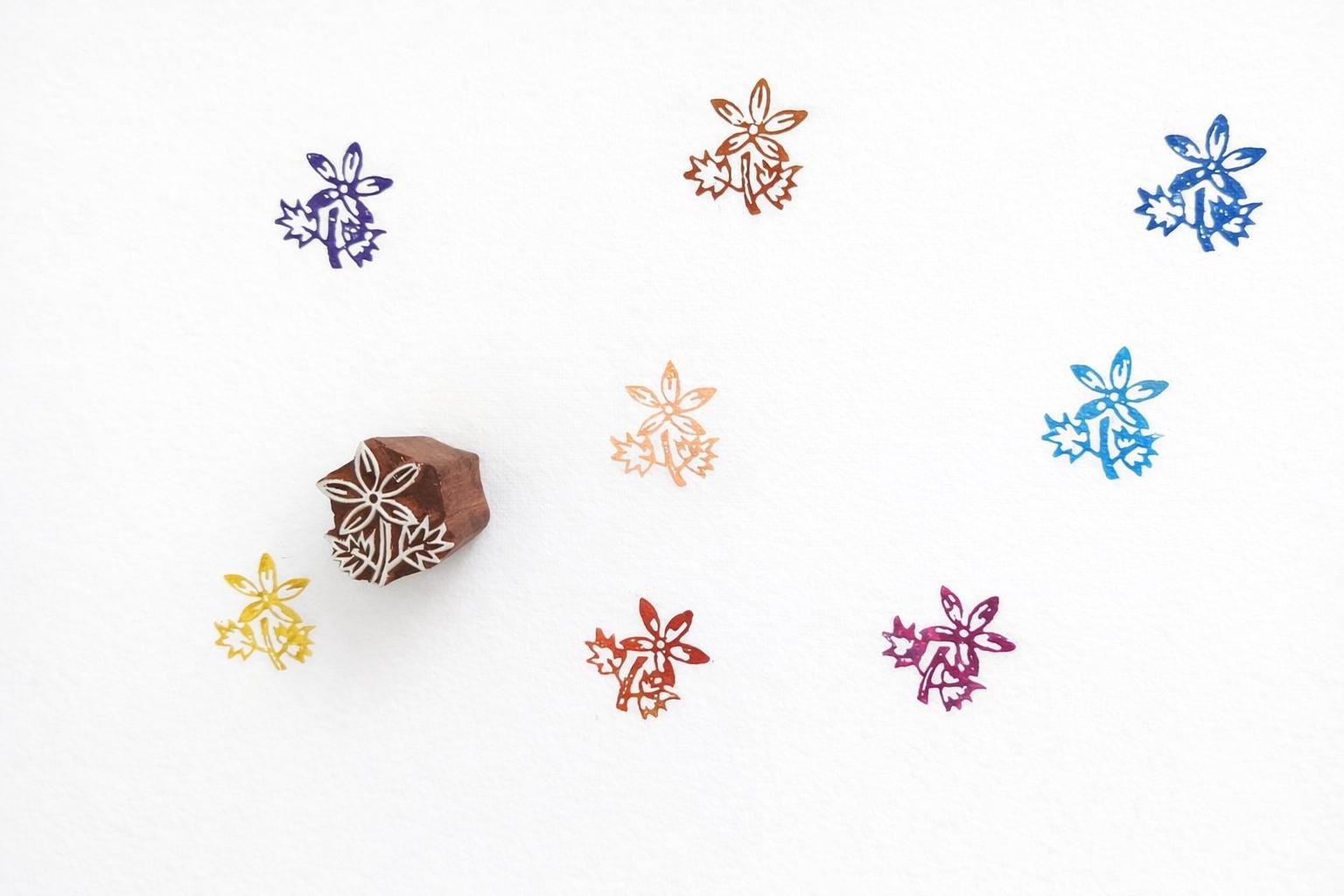 Wooden wildflower block print stamp with detailed floral design