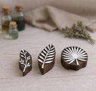Wooden botanical block printing stamps for fabric printing including twig leaf and palm designs handmade in India