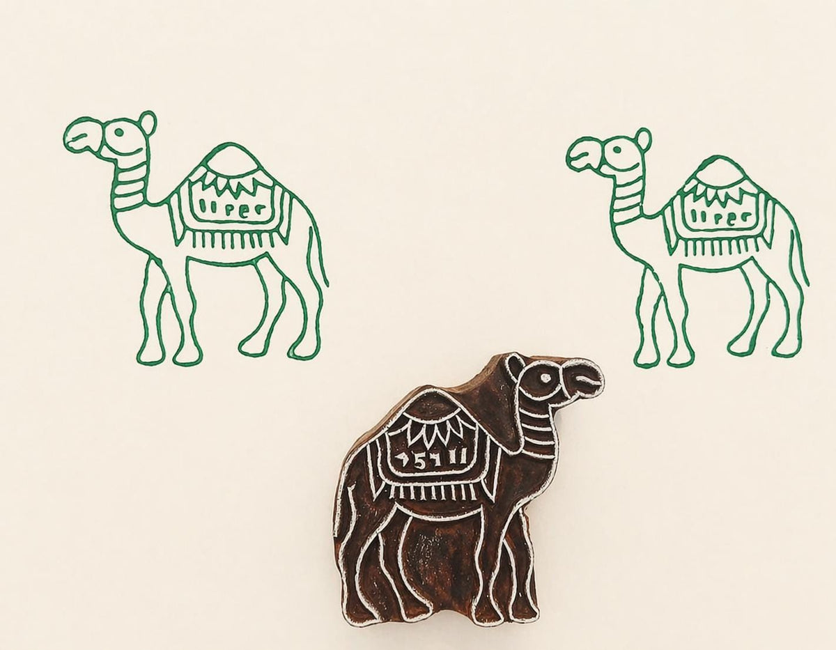 Camel wooden printing block creating traditional print on paper