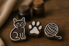 Hand carved Indian wooden printing block set featuring cat, paw print, and yarn ball designs for fabric printing, pottery, clay, and DIY textile crafts.
