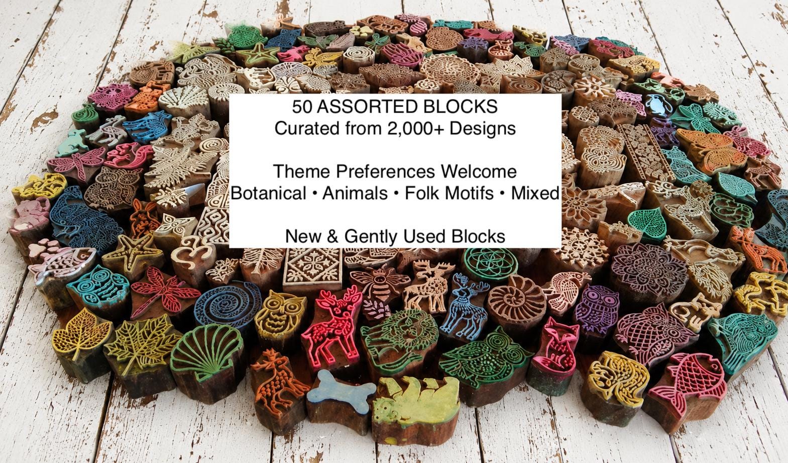 Information graphic explaining a curated set of 50 assorted wooden printing blocks selected from over 2,000 designs with theme preferences available and a mix of new and gently used blocks.