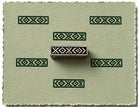 Hand carved geometric border block stamp printing repeating folk pattern border motifs
