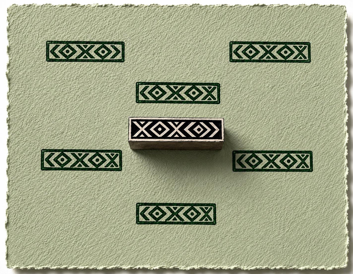 Hand carved geometric border block stamp printing repeating folk pattern border motifs