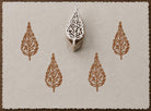 Hand carved ornate botanical leaf wooden printing block with repeated leaf impressions on handmade paper