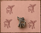 Hand-carved Woodland Fawn wood block stamp with brown deer impressions on blush handmade paper.