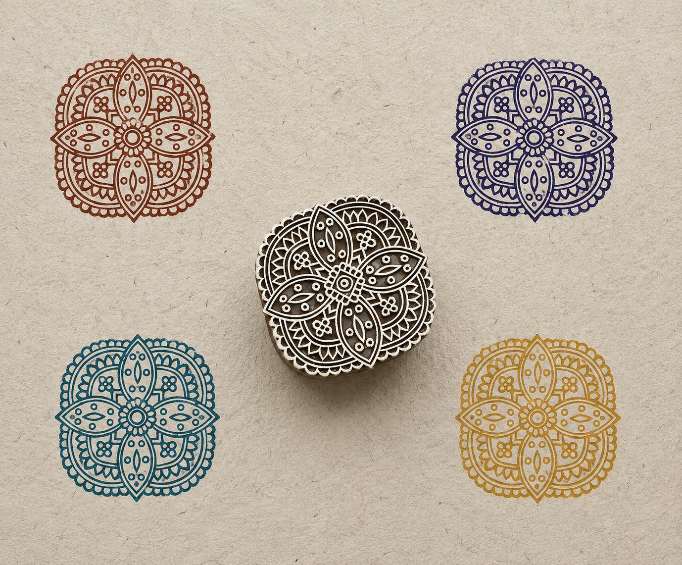 Hand carved wooden block printing symmetrical four petal mandala pattern in various colours