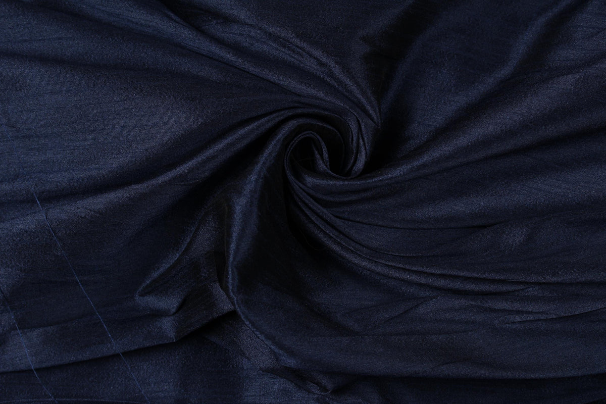 Close-up of midnight navy poly dupioni fabric showing its finely textured surface and subtle faux silk sheen.