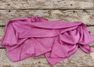 Vintage pink and white checked pure silk saree fabric draped to show its soft flowing texture