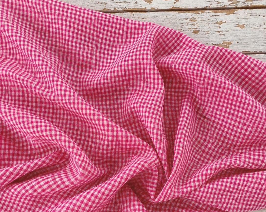 ink and white checked vintage pure silk fabric shown draped to reveal its lightweight flowing quality