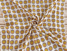 Colourful Indian folk lion block print on soft cotton fabric shown in a flowing drape