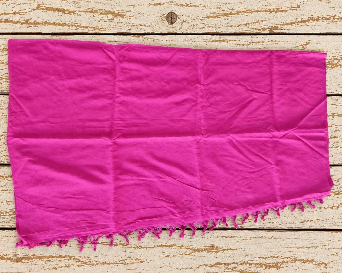 Large continuous fuchsia silk sari textile showing the fabric width and long usable length