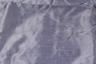 Smoky lavender faux dupioni fabric shown flat, highlighting the subtle textured surface and soft silvery sheen.