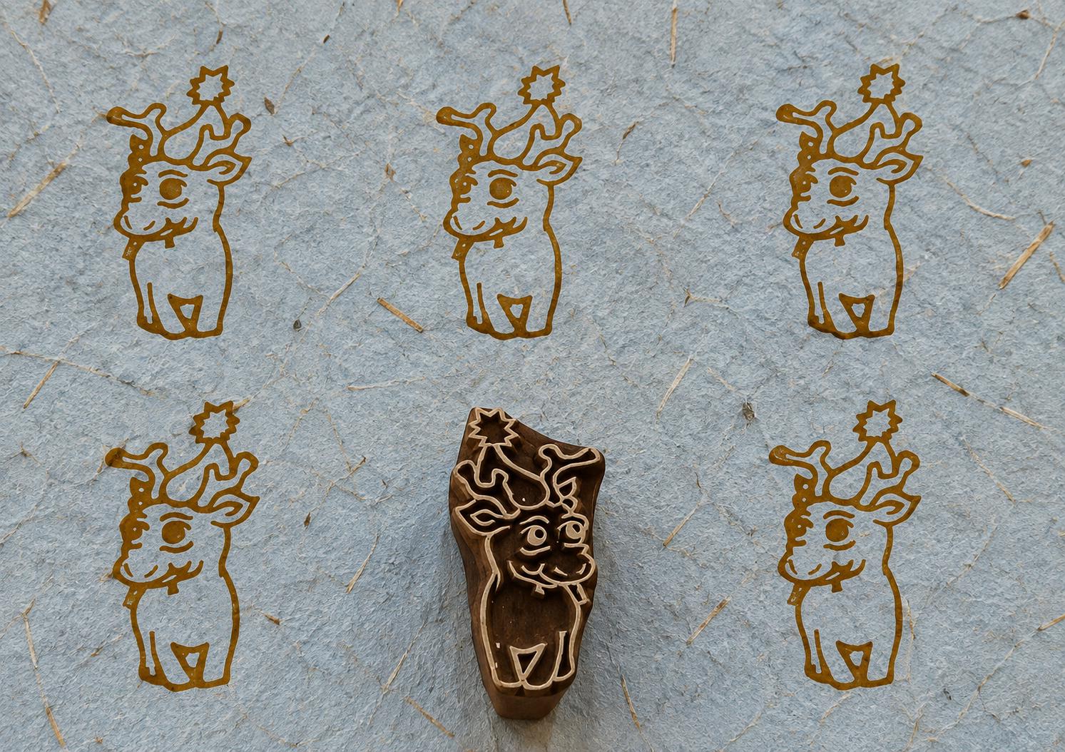 Baby reindeer wooden printing blcok on handmade paper