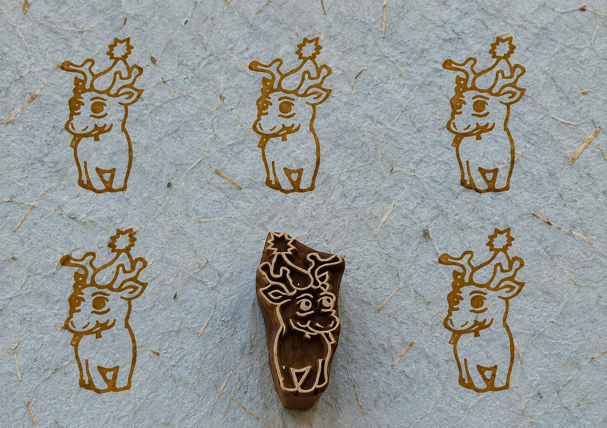 Baby reindeer wooden printing blcok on handmade paper