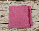 Close-up of the fine pink and white checked weave on vintage pure silk saree fabric