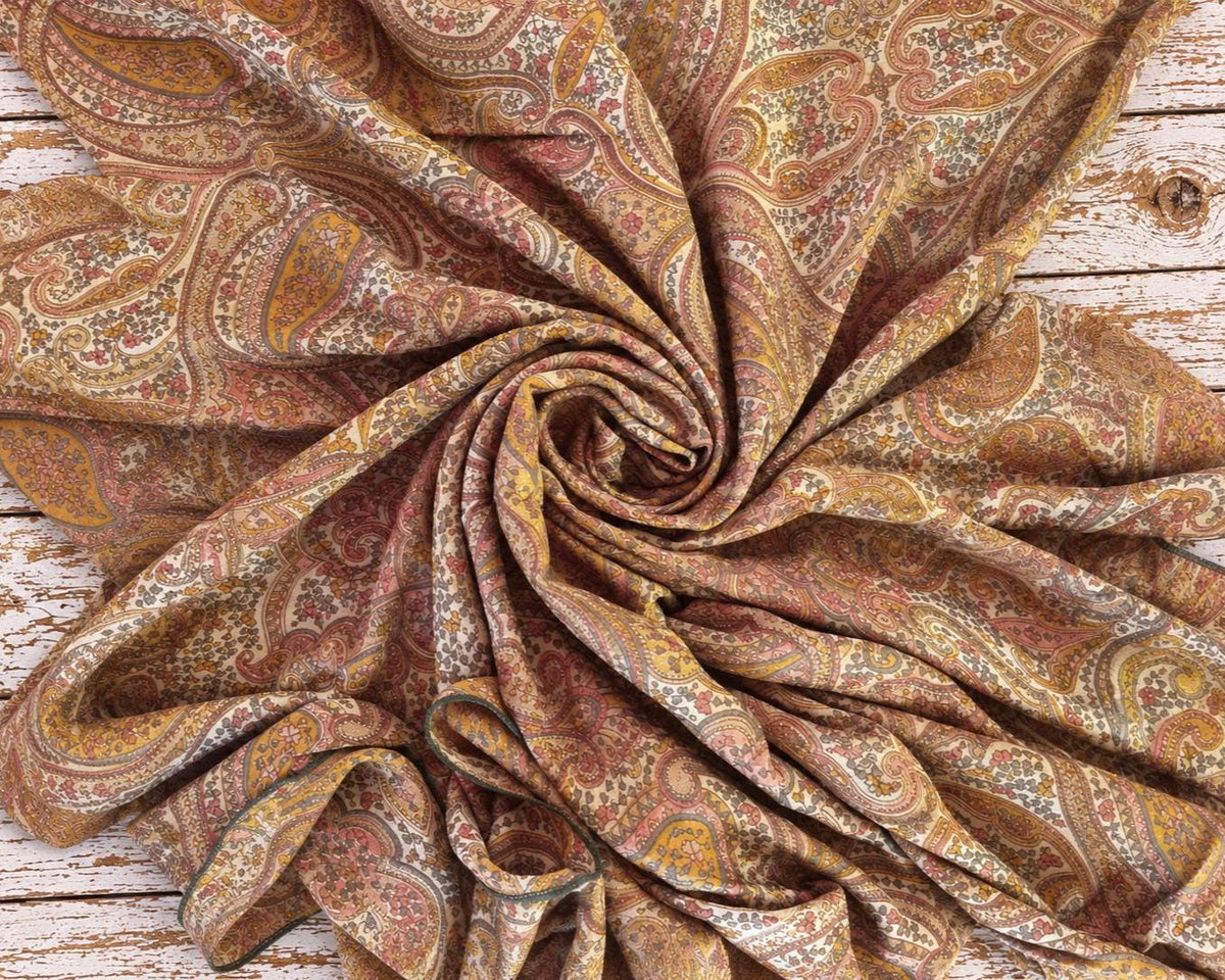 Vintage recycled Indian sari silk chiffon draped to show its ornate paisley floral print and flowing texture